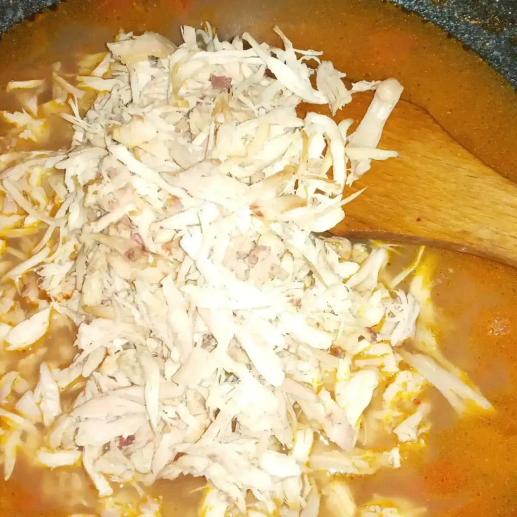 adding-chicken-in-broth