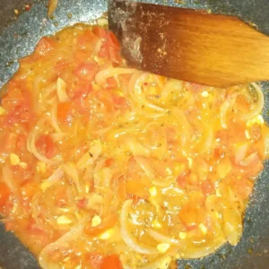 sauteing-onions-tomatoes